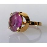 A gold and amethyst dress ring, size O, hallmarked 9ct, 6.2g