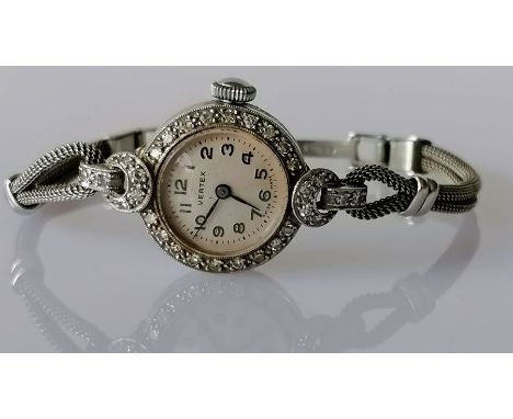 An Art Deco ladies platinum-cased diamond-set manual cocktail watch on a later 9ct white gold bracelet, case 18mm diameter, A