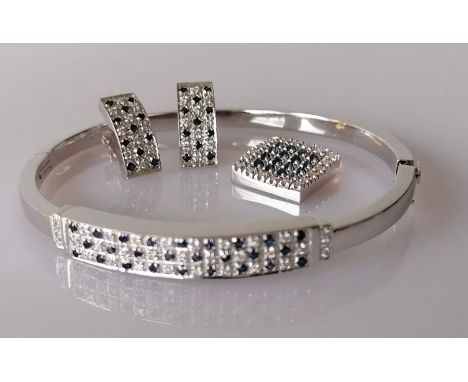 A diamond and sapphire parure on 18ct white gold comprising bangle, earrings and pendant, total diamond weight approximately 