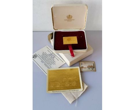 A cased 22ct gold replica of 'The Locomotion' postage stamp, 1975 with CoA no. 1589 and original packaging, from Hallmark Rep