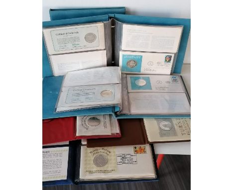 Three albums each containing five United Nations/Franklin Mint medallic First Day Covers from 1973, '74, '76, each including 