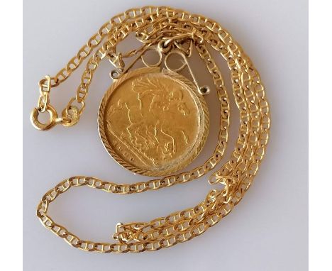A Victorian gold half sovereign, 1900, on a 9ct gold mount and chain, hallmarked, 7.5g
