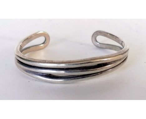 A Tiffany &amp; Co. silver bangle, stamped .925, Italy