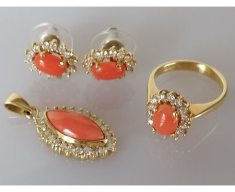 A yellow gold coral and diamond cluster ring with matching pendant and earrings: ring size K, stone 7 x 5mm, pendant stone 15