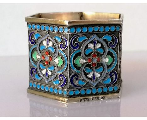 An early 20th century Russian silver .875 (84 Zolotniki) and enamel cloisonné hexagonal napkin ring, Moscow marks, maker CW, 