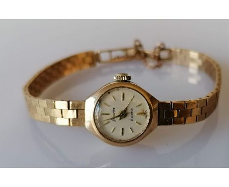 A mid-century ladies Accurist dress watch with 9ct gold case and bracelet strap, hallmarked, catch faulty, 16g