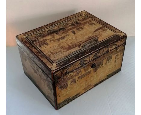 A larger Victorian Chinese export gilt-decorated black lacquer tea caddy, decorated with figures, pavilions and trees, enclos