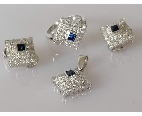 A diamond and sapphire parure on 18ct white gold featuring a square cluster ring with 28 round brilliant-cut diamonds, approx