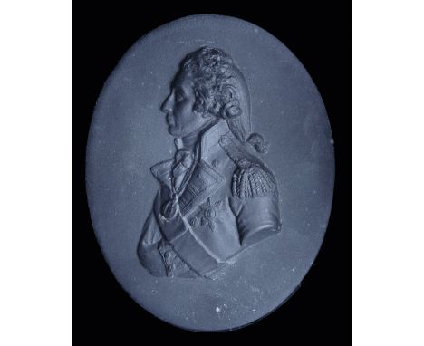A Black Basalt Portrait Plaque of Lord Nelson, unmarked, by or after Wedgwood, 74mm x 94mm x 9mm, typical perforations to rev