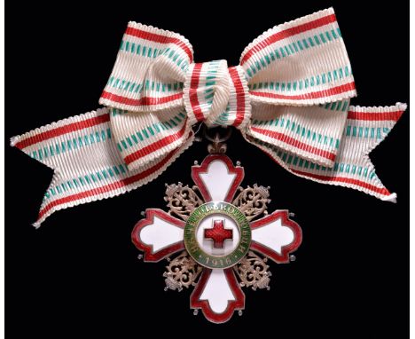 *Bulgaria, Red Cross Order, Second Class breast badge, in silver-gilt and enamels, width 45.5mm, on Ladies’ bow and in case o