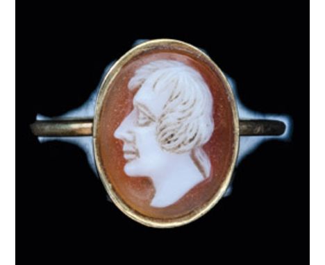 *A Lord Nelson Cameo Ring, c.1800-1820, the unmarked gold ring set with a cameo portrait of a youthful Nelson, ring 19mm diam