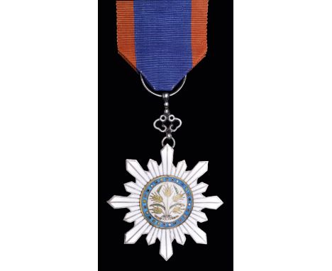 *China, Republic, Order of the Golden Grain, Sixth class breast badge, in silver, gilt and enamels, width 50.5mm, in cloth ca
