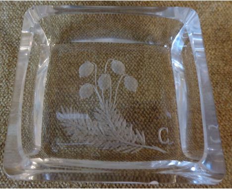 An Orrefors pin tray with intaglio flowers