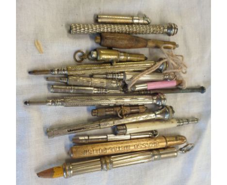 A bag containing assorted vintage propelling pencils including novelty cannon hardstone mounted, advertising, etc.