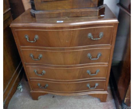 A 28" reproduction mahogany serpentine front chest of four long drawers, set on bracket feet - for repolishing
