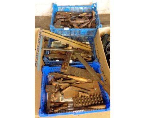 Three trays containing a quantity of vintage hand tools