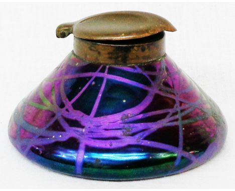 A Secessionist Movement purple iridescent glass inkwell in the Loetz style with bronzed cap