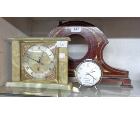 An early 20th Century inlaid walnut mantel clock case, a Tempora green onyx battery timepiece and a Chinese five rams vintage