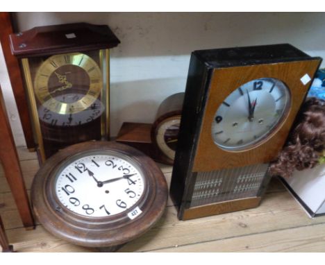 An early 20th Century stained wood cased dial wall timepiece - sold with a mid 20th Century walnut cased chiming mantel clock