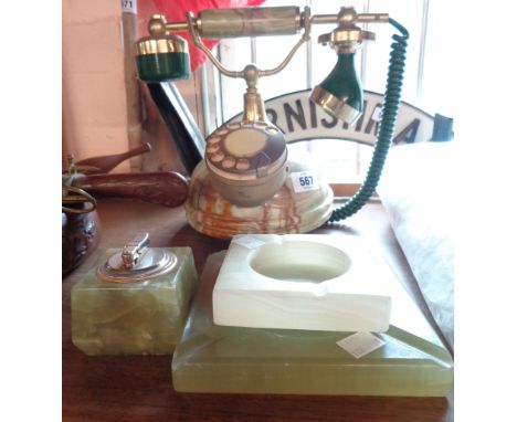 A vintage green onyx dial telephone - sold with an onyx desk lighter and two ashtrays