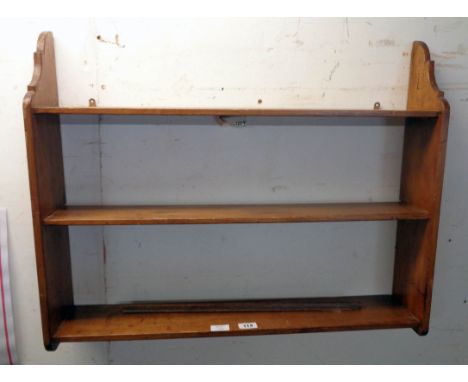 A 31" old stained pine three shelf wall unit with shaped sides