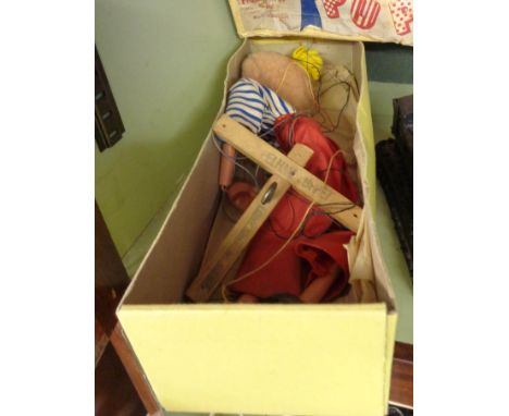 A boxed Pelham junior control puppet Type L8 Boy