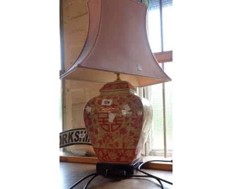 An Oriental temple jar pattern lamp with shade