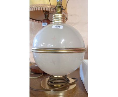 A vintage globular table lamp with frosted and spangled finish