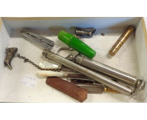A quantity of small collectables including bookmark, thermometer, button hooks, spring scales, green phenolic needle case, et