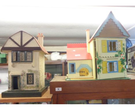 A vintage Mock Tudor dolls house and another vintage example