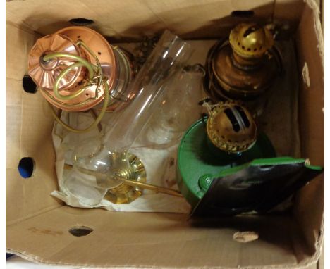 A vintage green enamel wall bracket oil lamp and shade, a copper and brass ship's lamp (converted to electric) and another