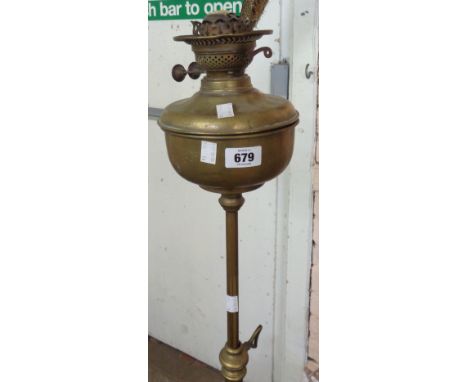 A brass telescopic oil lamp and standard