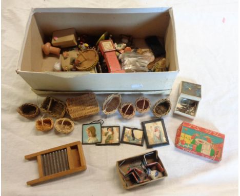 A good collection of vintage dolls house furnishings including baskets, crockery, longcase clock, ornaments, pictures, shoe b