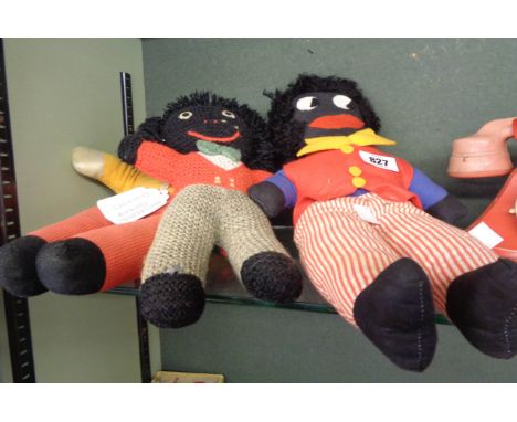 A vintage musical Golly doll - sold with a knitted example and another