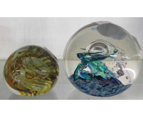 A small Isle of Wight glass paperweight with internal swirls - sold with a Selkirk glass 'Seascape' paperweight with internal