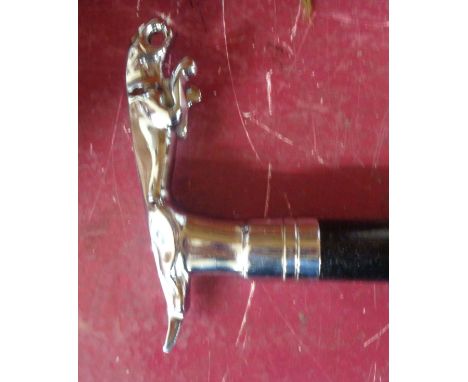 A modern reproduction walking stick with Jaguar top