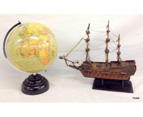 A Globe Named Geographica Fleet street London size 10inches and a model of a sailing ship