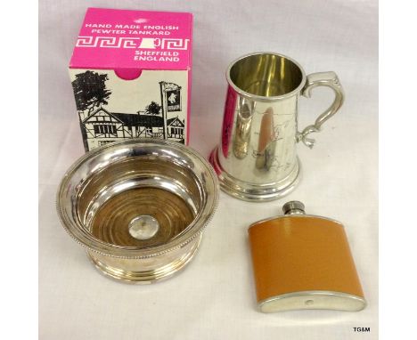 A boxed pewter tankard, silver plated wine coaster and drinking flask