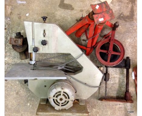 A bench bandsaw and a vintage bench hand dill, 2 axle stands and a bottle jack