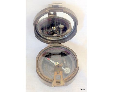 A round Brunton compass