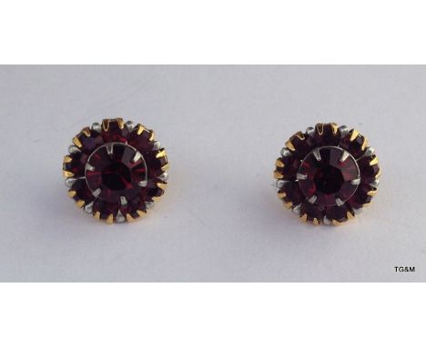 A pair of 9ct gold and ruby hallmarked earrings