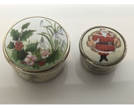 Two silver festive enamel boxes, one 4cm diameter and one 3cm diameter approx
