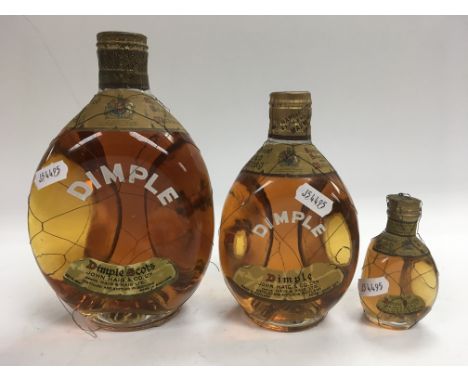 3 bottles of mid 20th century Dimple Scotch Whiskey.