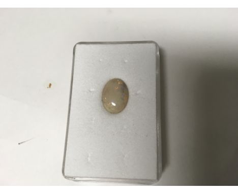 An oval opal stone. Weight approx 0.74g