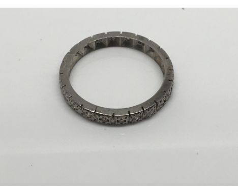 A white Gold diamond set eternity ring with 22 diamonds ring size L,