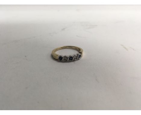 A 14ct yellow and white gold diamond and sapphire ring. Size approx N, weight approx 2.3g