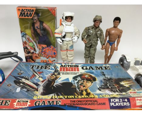 A collection of Action Man figures including a boxed Dr X, an astronaut with lunar module, a canoe and various other figures 