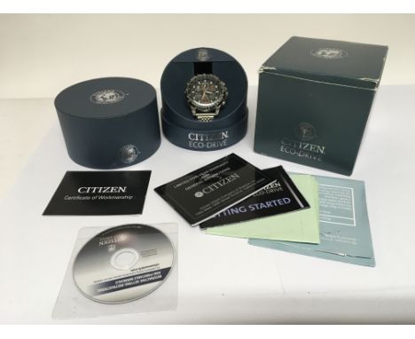 A gents Citizen eco drive chronograph wristwatch with related paperwork.