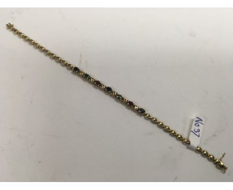 An emerald, sapphire, ruby and diamond set bracelet. Weight approx 9.6g, length approx 19cm.