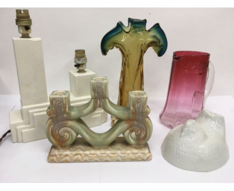 An Art Deco white glazed table lamp, Beswick candlestick, cranberry jug, art glass vase and a ceramic chicken mould.